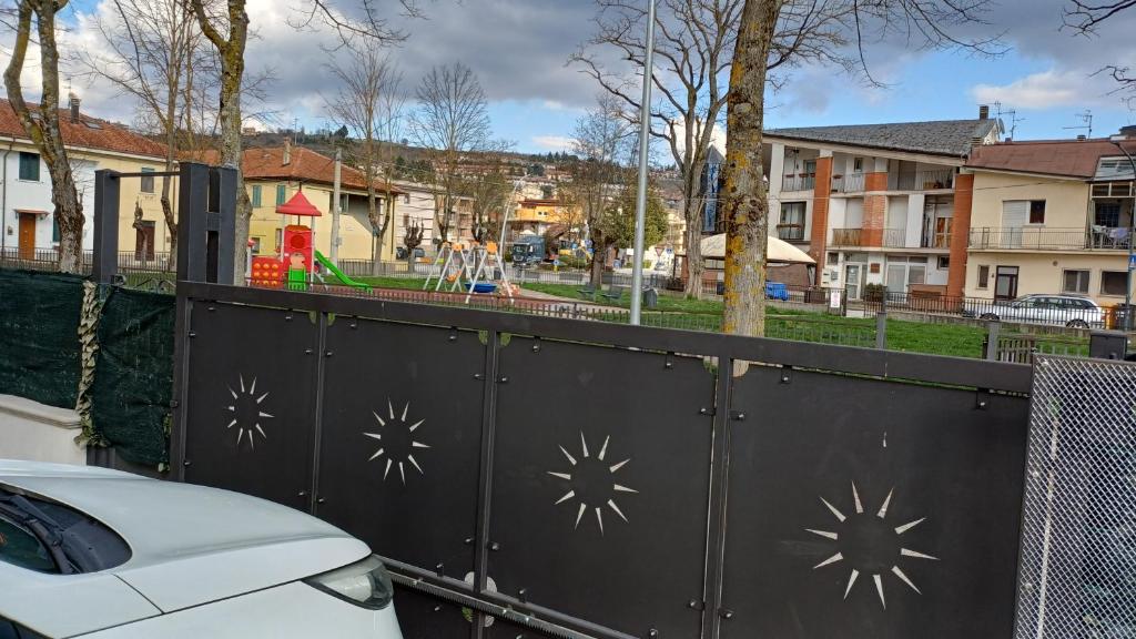 a black fence with snowflake designs on it at il Biscottino in Castel di Sangro