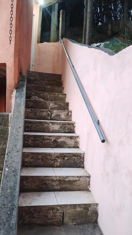 a set of stairs leading up to a building at Cabana in Santo Antônio do Pinhal