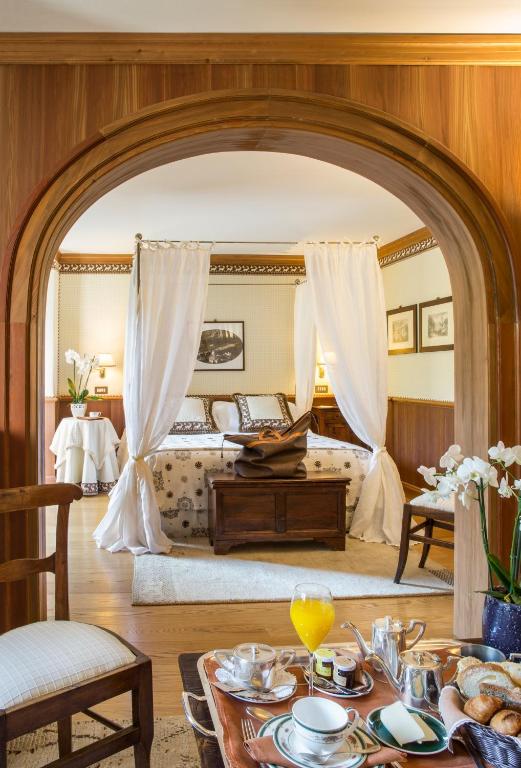 Posezení v ubytování Hotel Hermitage Relais & Châteaux