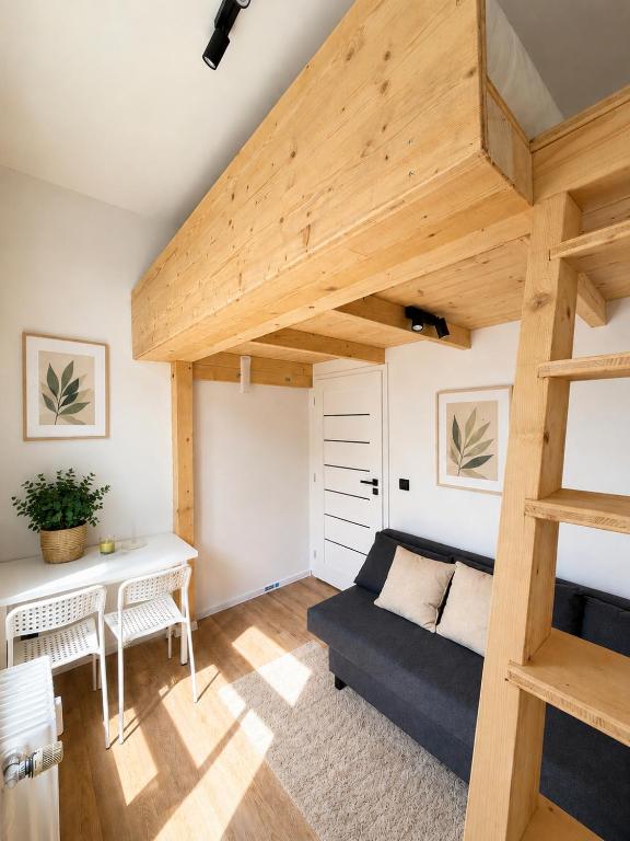 a living room with a loft bed and a couch at Milada 7 Suits in Brno