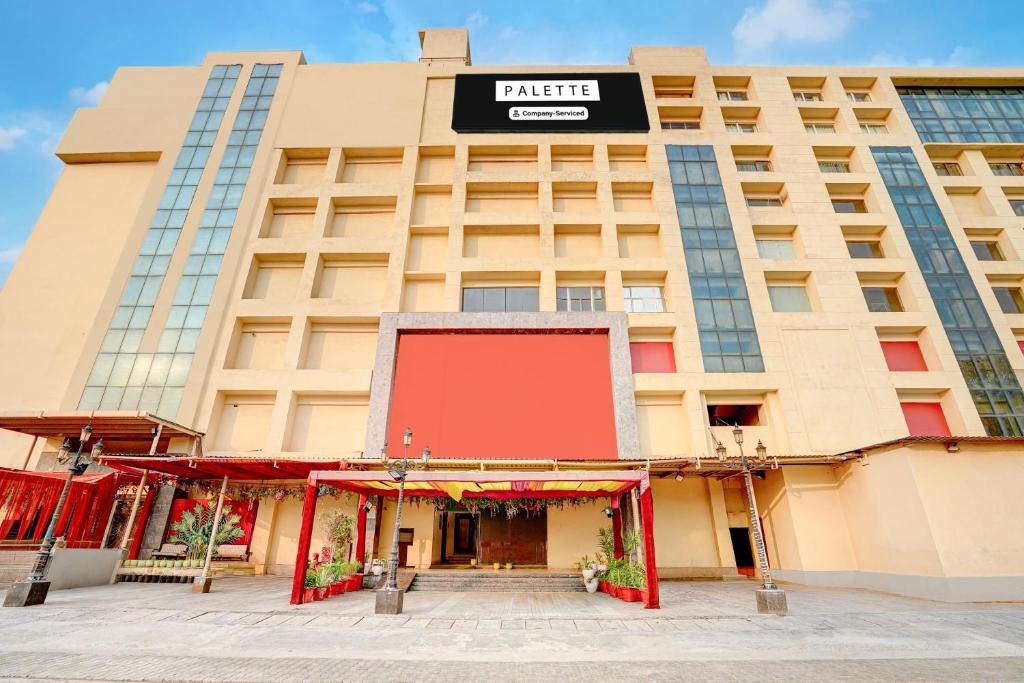 a rendering of the exterior of a hotel at Palette A Lux Corporate Townhouse Near 3 Minutes Kaushambi Metro Station in Ghaziabad