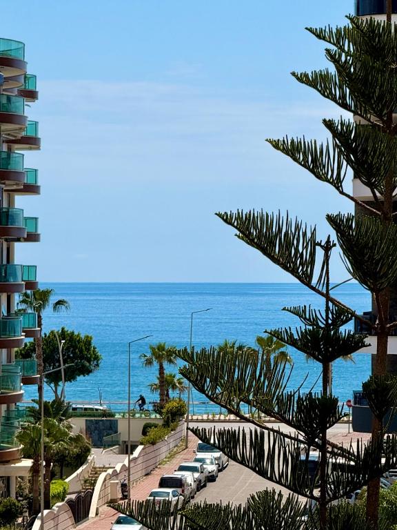 a view of the ocean from a resort at SA Apartments! Family 2BD Flat 150m to the Beach in Alanya