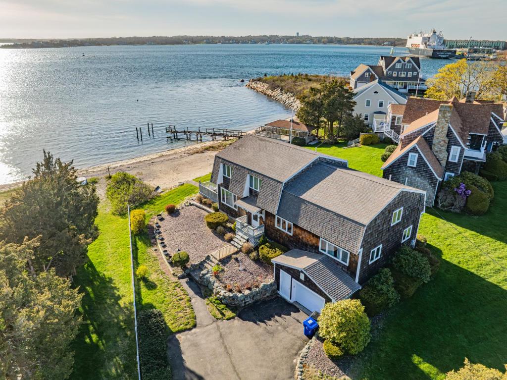 an aerial view of a house on the water at Cape Cod Waterfront with Stunning Views in Buzzards Bay