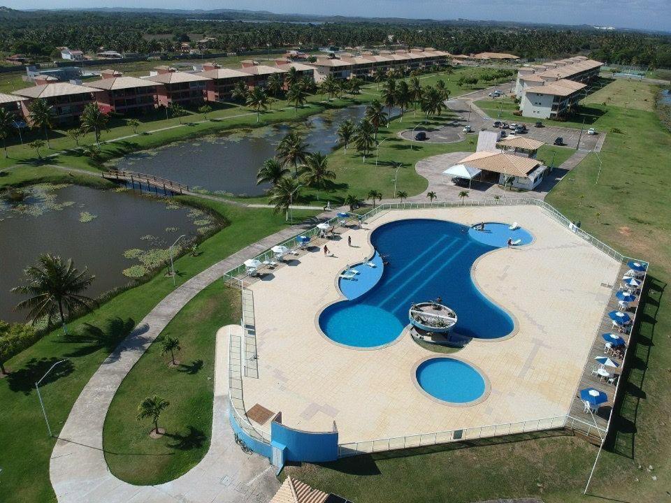 an aerial view of a resort with a swimming pool at Apart Resort Vila das Águas Veraneio in Estância