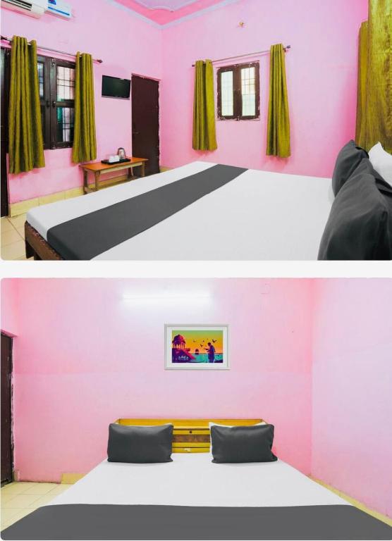 a bedroom with pink walls and a bed at Hotel cozy guest house in Alīgarh
