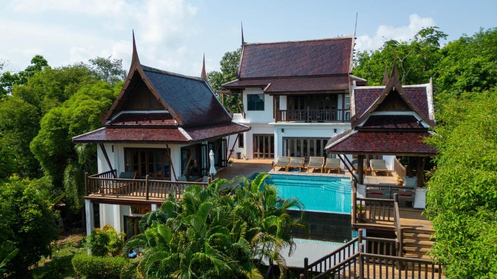 an aerial view of a house with a swimming pool at Private Pool 4BR Villa with Sea View Sleeps 8 in Mae Pim