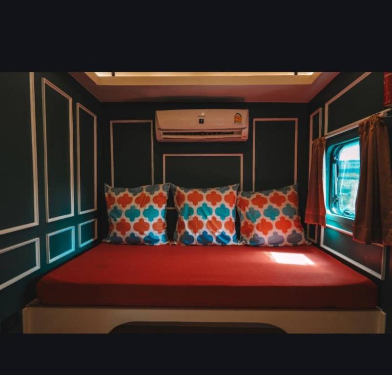 a bed in the back of a train at Villa PaSon in Khao Kho