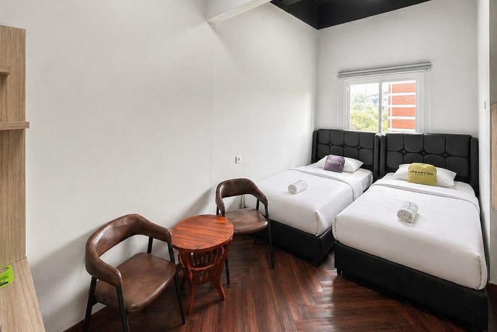 Urbanview Hotel The Tang Balikpapan by RedDoorz - Habitación Doble Deluxe