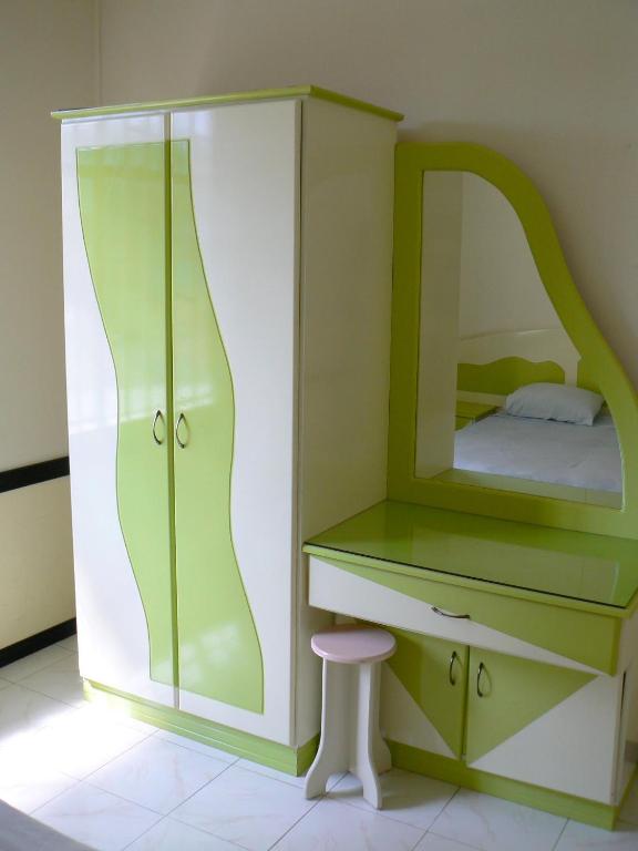 Postel nebo postele na pokoji v ubytování Apartments la Colombe