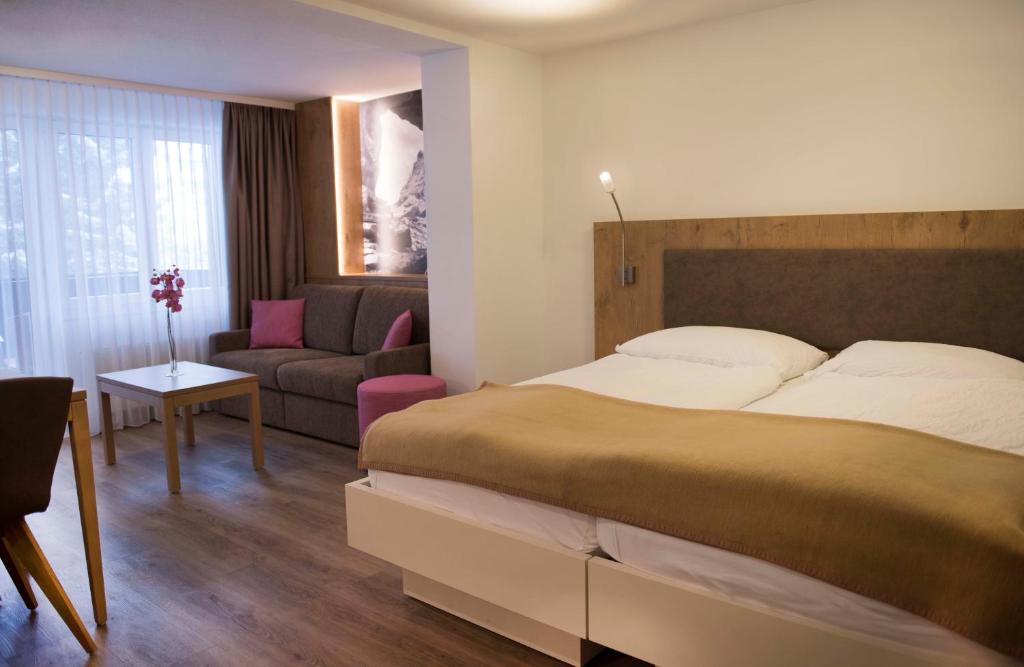 Postel nebo postele na pokoji v ubytování Apartments Patricia