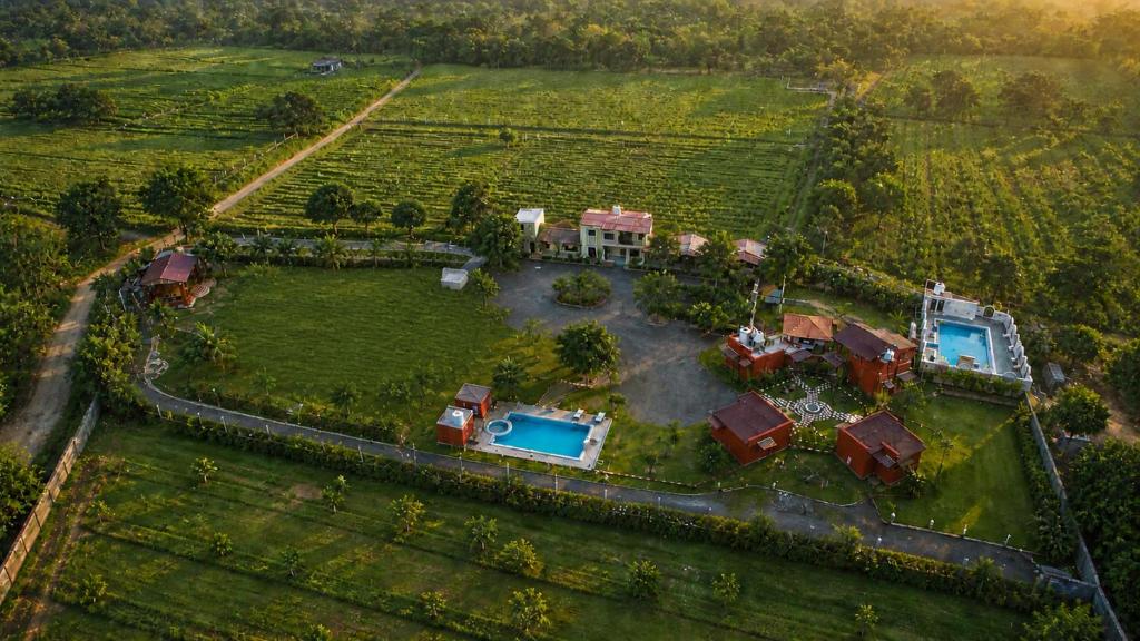 an aerial view of a large estate with a house at Gir Wildtrack Lodge - Into the Deep Forest in Sasan Gir