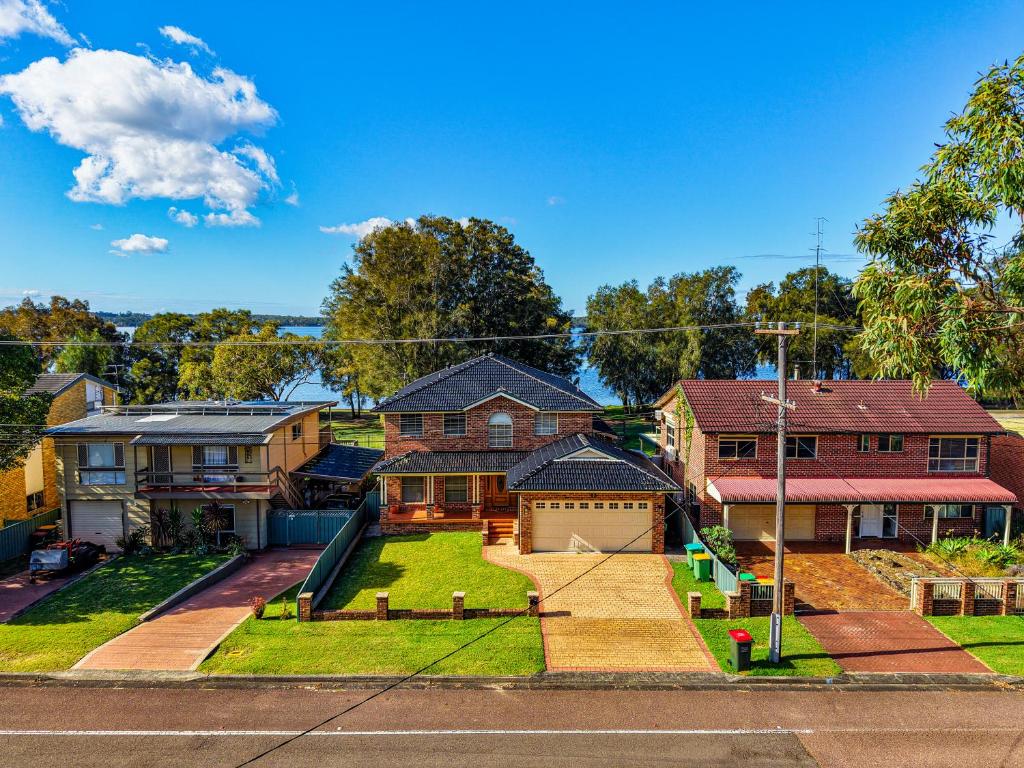 an aerial view of a house with a yard at Panorama Shores in Lakeside