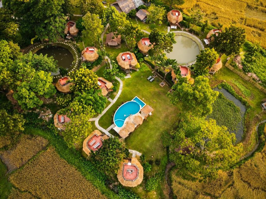 an aerial view of an estate with a swimming pool at The Countryside Pai in Pai