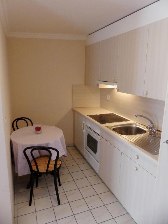 Kuchyň nebo kuchyňský kout v ubytování Hotel Rigi Vitznau