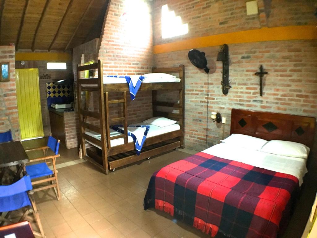 Llit o llits en una habitació de Cabañas La Carolina - Mesa de Los Santos