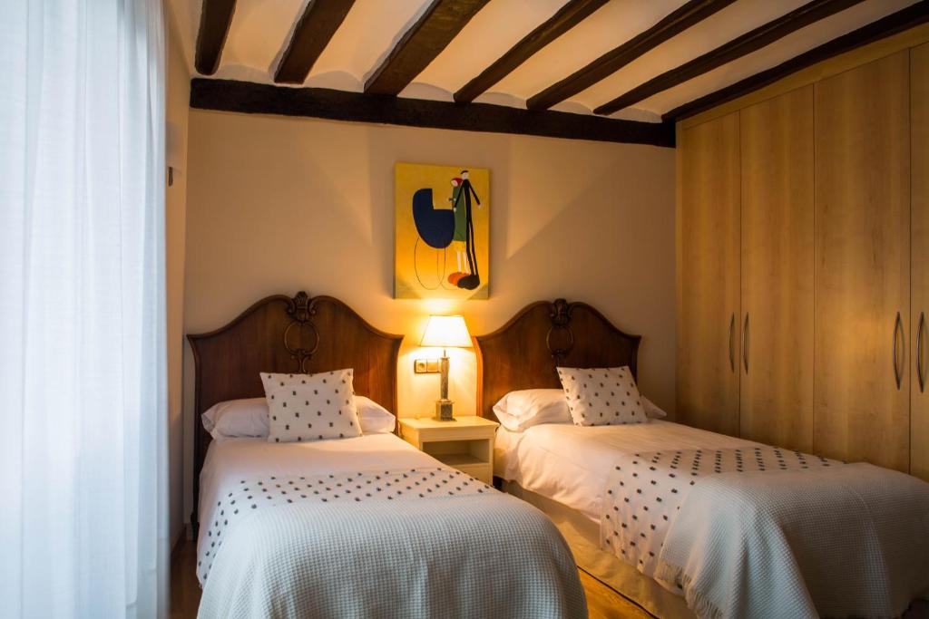Postel nebo postele na pokoji v ubytování Casa de la Cadena