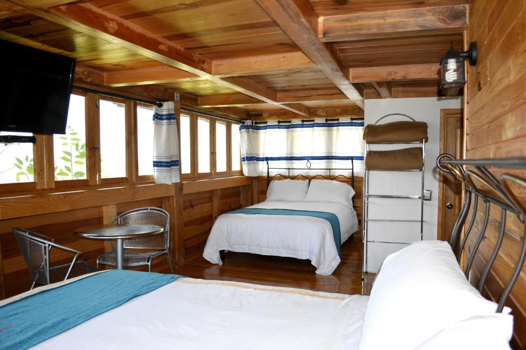 Postel nebo postele na pokoji v ubytování Cabañas el Chalet