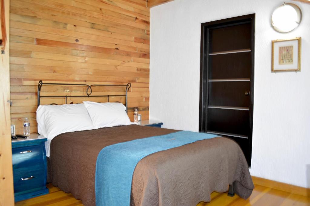 Postel nebo postele na pokoji v ubytování Cabañas el Chalet