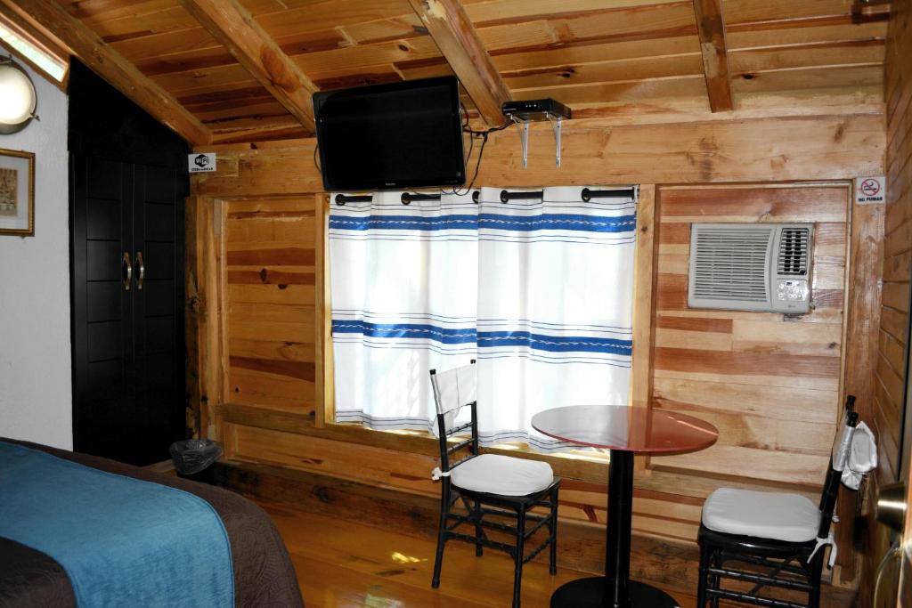 Postel nebo postele na pokoji v ubytování Cabañas el Chalet