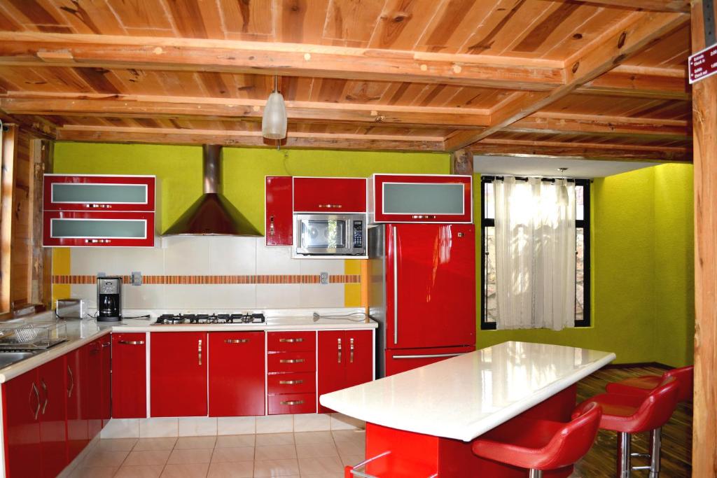 Kuchyň nebo kuchyňský kout v ubytování Cabañas el Chalet