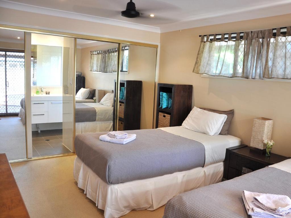 Postel nebo postele na pokoji v ubytování TL Warmest Homestay