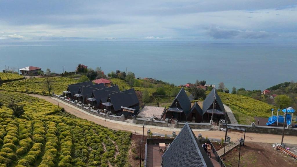 an overhead view of a building with black roofs at Bona Dea in Cayeli