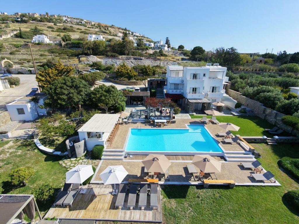 an aerial view of a villa with a swimming pool at Roses Beach in Parikia