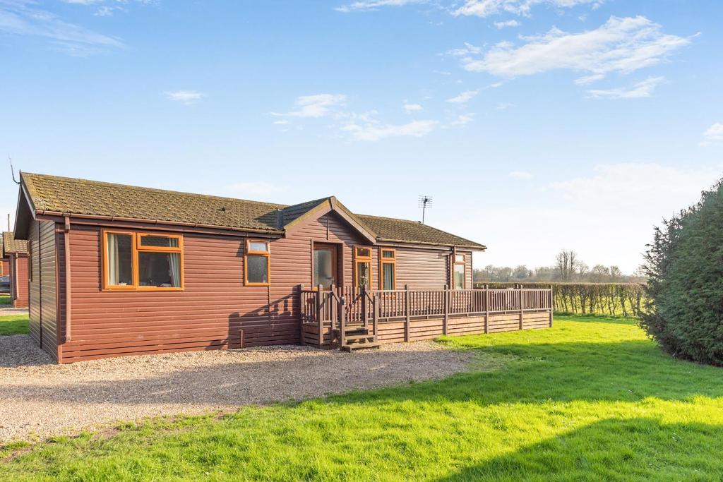 a home with a wooden house with a yard at Field View 2 bed-No pets-Hornbeam in Eye