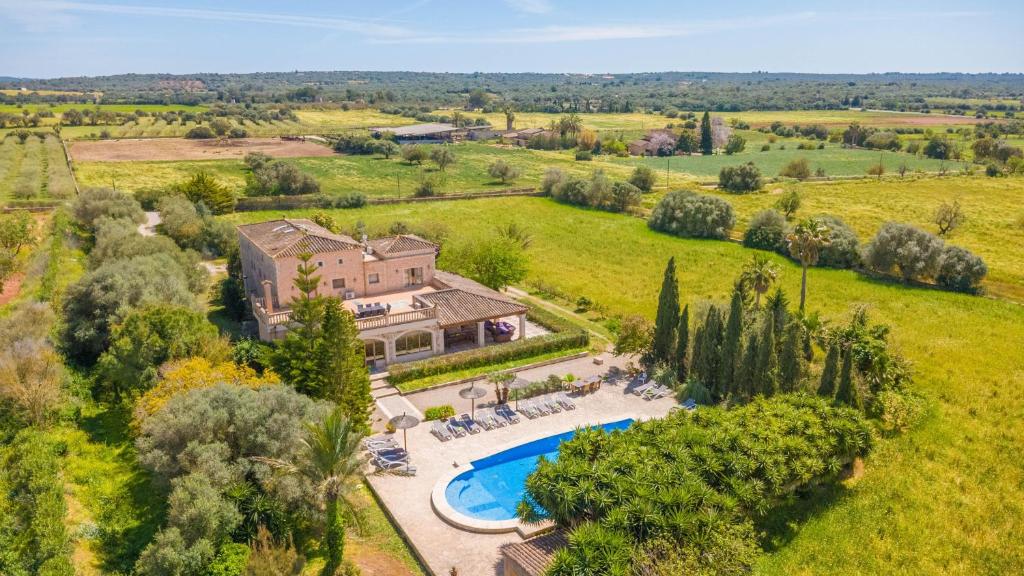 an aerial view of a large house with a swimming pool at Na Pont in Campos