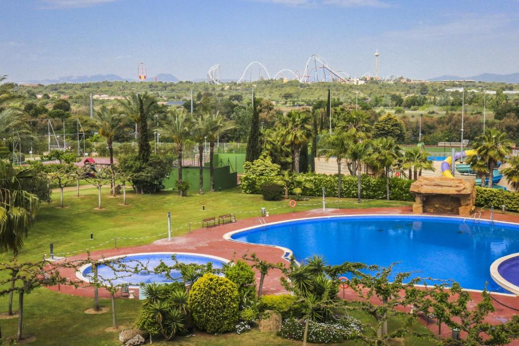 an image of a pool at a park at Los Juncos HomeStay by Turismar in La Pineda