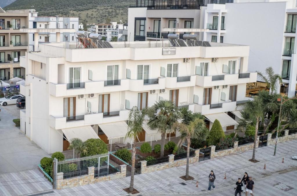 an aerial view of a white building at Resol Hotel in Ksamil