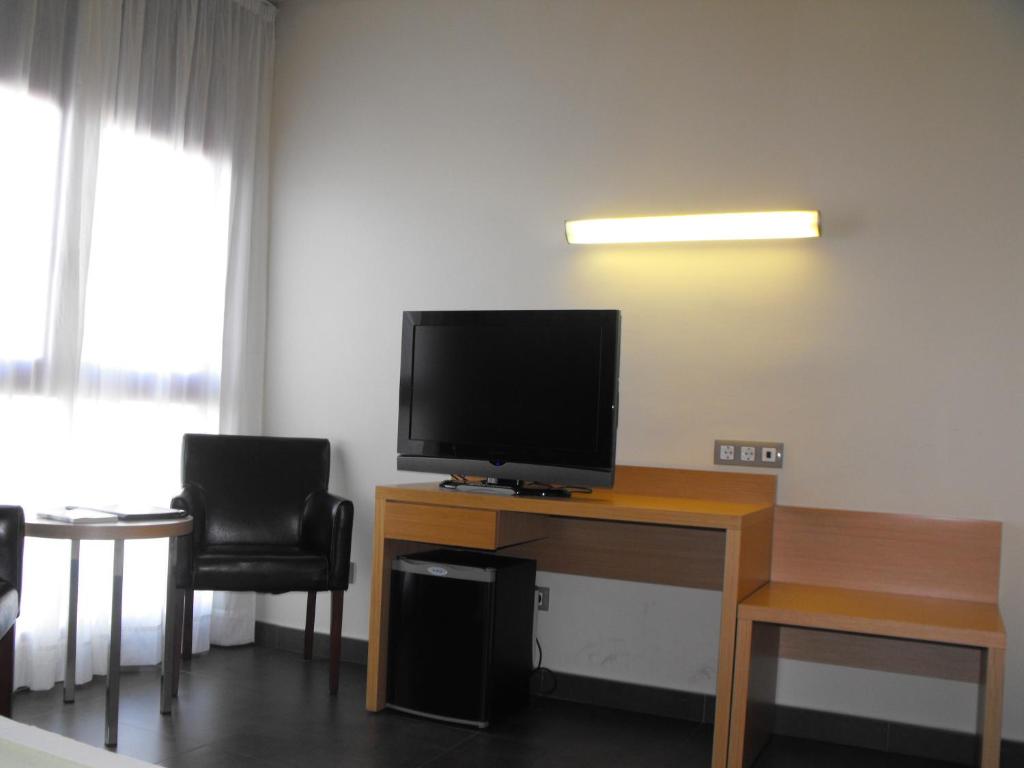 TV a/nebo společenská místnost v ubytování Hotel Pere III El Gran