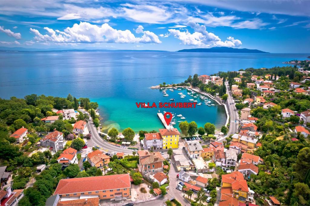 an aerial view of a small town on the water at Hotel Villa Schubert in Opatija