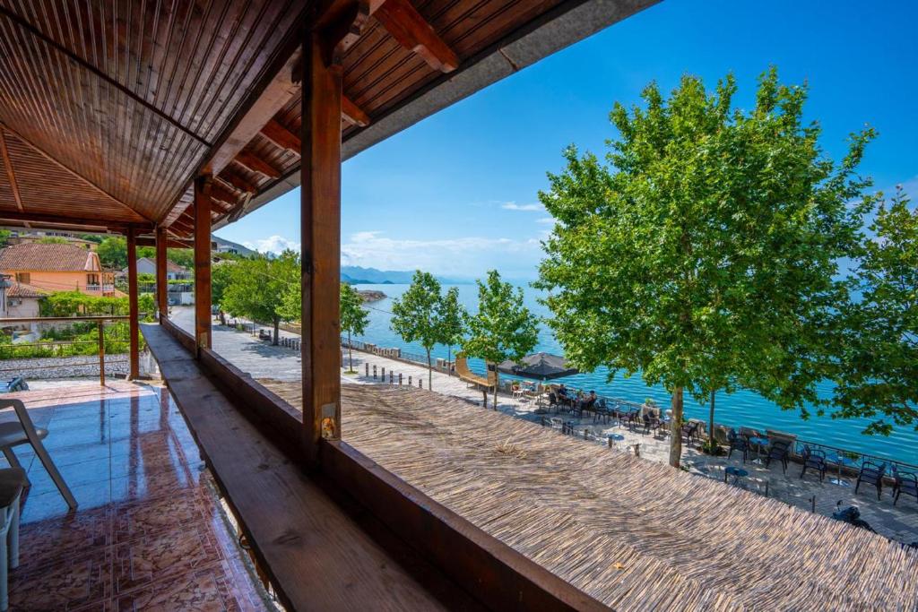 a view of the water from a resort balcony at Shiroka Stays in Shirokë