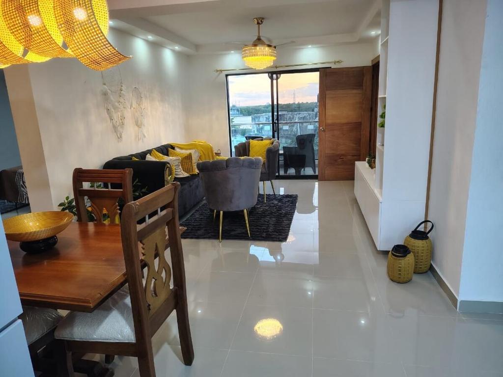 a living room with a couch and a table at Beautiful View Apartment in San Pedro de Macorís