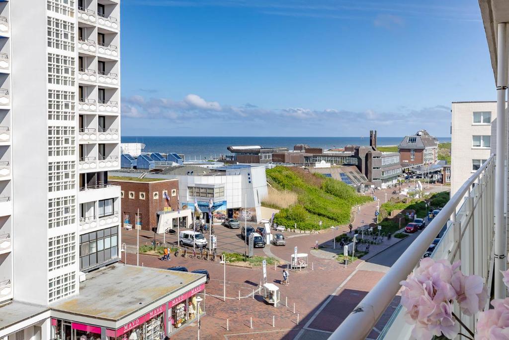 a view of a city from a balcony of a building at Hein Wichtig in Boostedt