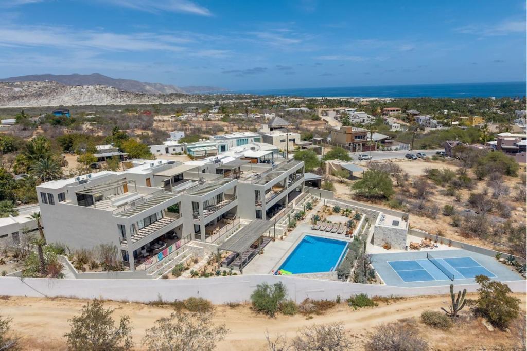 an aerial view of a house with a swimming pool at Modern 4BR Villa with Rooftop & Pickleball in Los Barriles