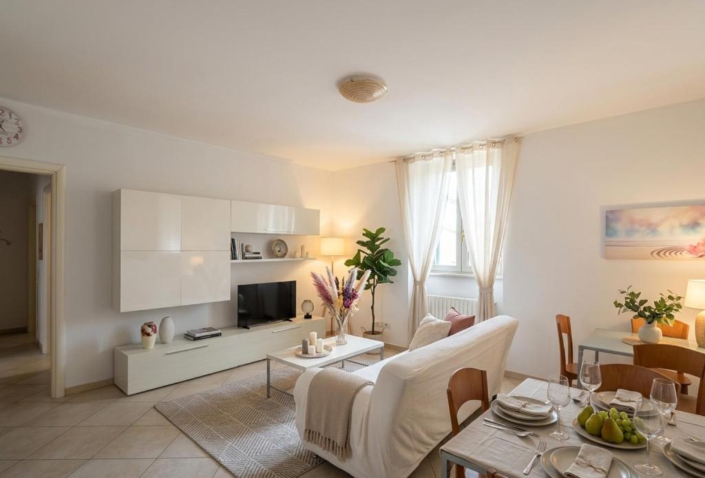a living room with a couch and a table at a casa di LUCA in Capriate San Gervasio