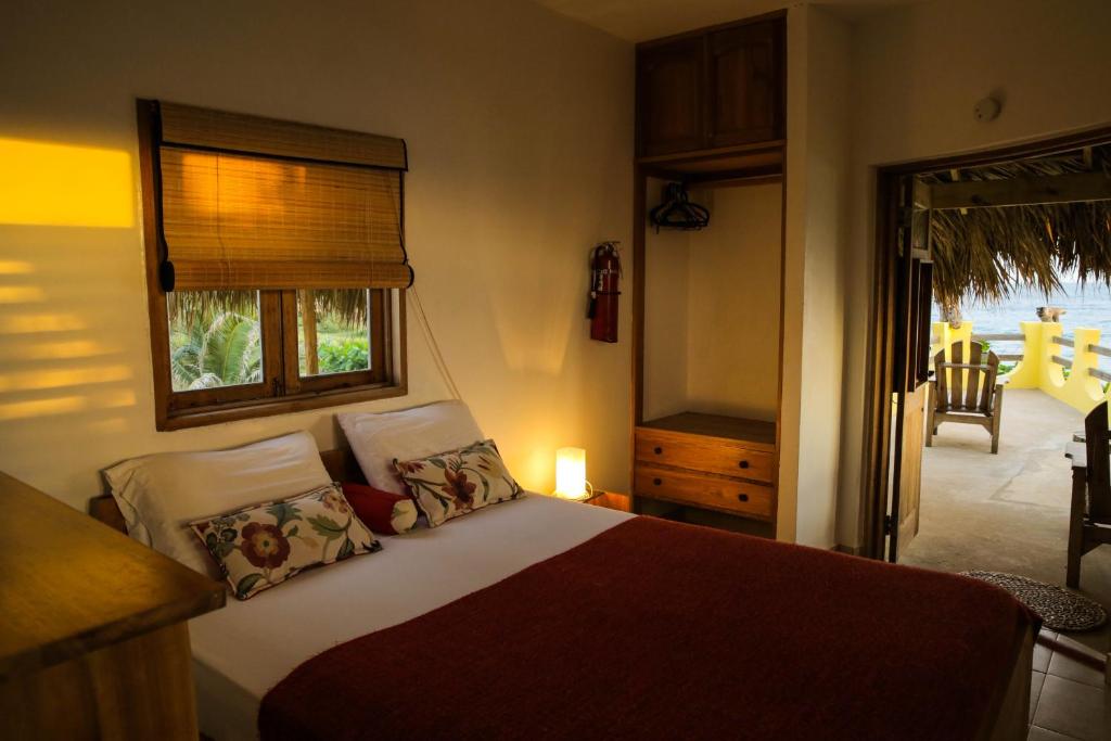 Postel nebo postele na pokoji v ubytování KuDehya Guesthouse