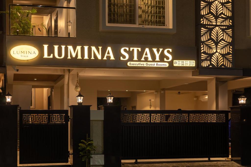 a restaurant with a sign that reads luna stays at Lumina Stays-Modern Luxury Rooms, Near NAD in Visakhapatnam
