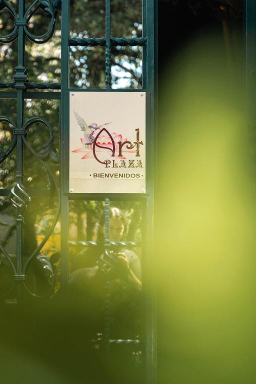 a sign on the side of a window at Art Plaza Boutique Hotel in Quito