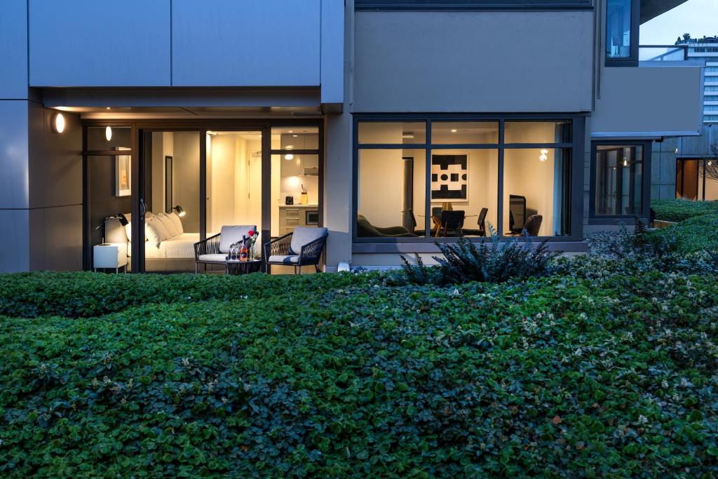 a house with a view of a yard at Revival English Bay, Vancouver in Vancouver