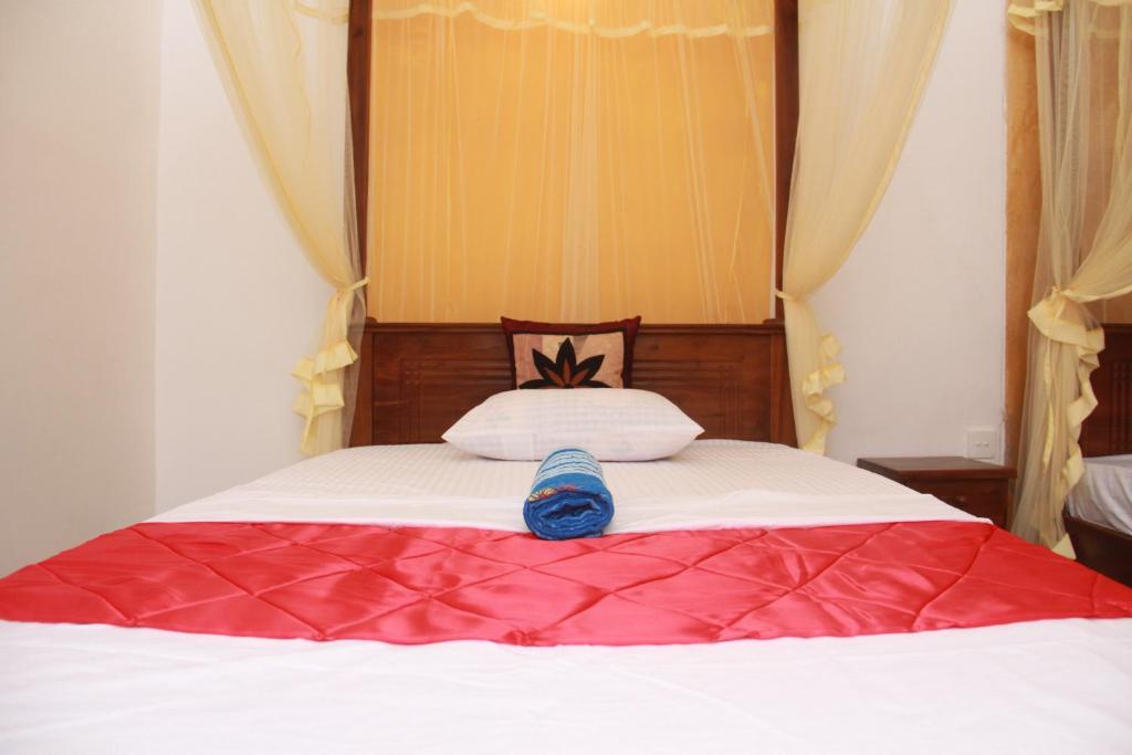 Postel nebo postele na pokoji v ubytování A One Calm Palace