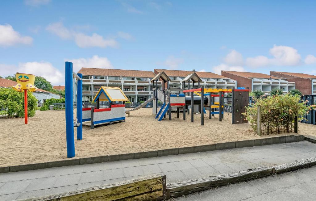 a playground in front of a building at Awesome Apartment In Faaborg With Sauna in Faaborg