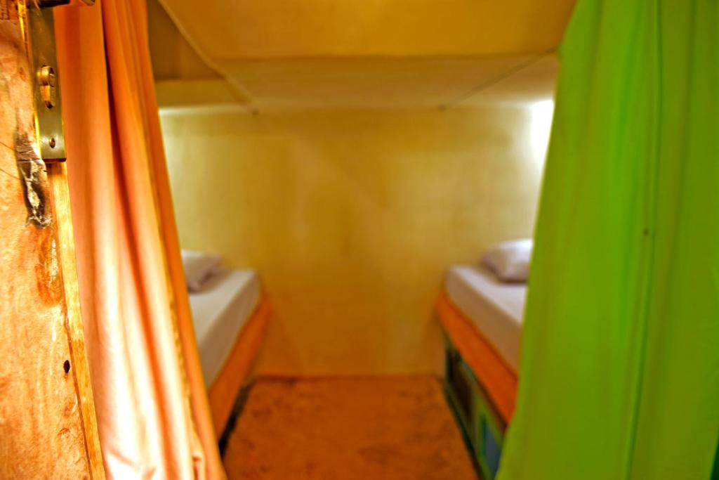 Letto o letti in una camera di The Rabbit Tree Hostel