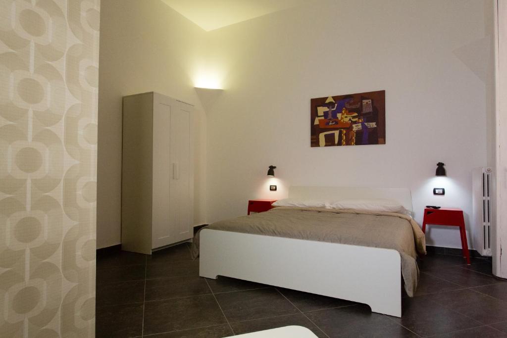 Posteľ alebo postele v izbe v ubytovaní Casa Retro'