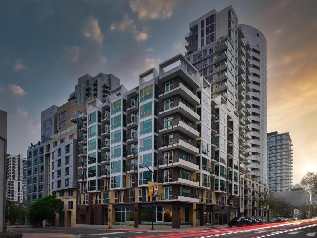 a rendering of a tall building on a city street at The Margot Hotel San Diego Gaslamp Quarter, Outset by Hilton in San Diego