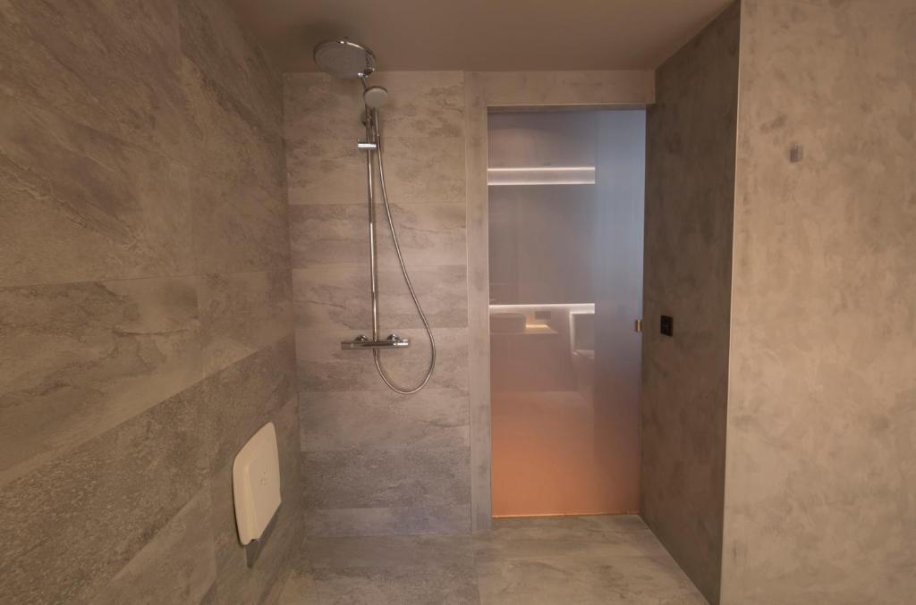 Koupelna v ubytování Hotel Xalet Montana