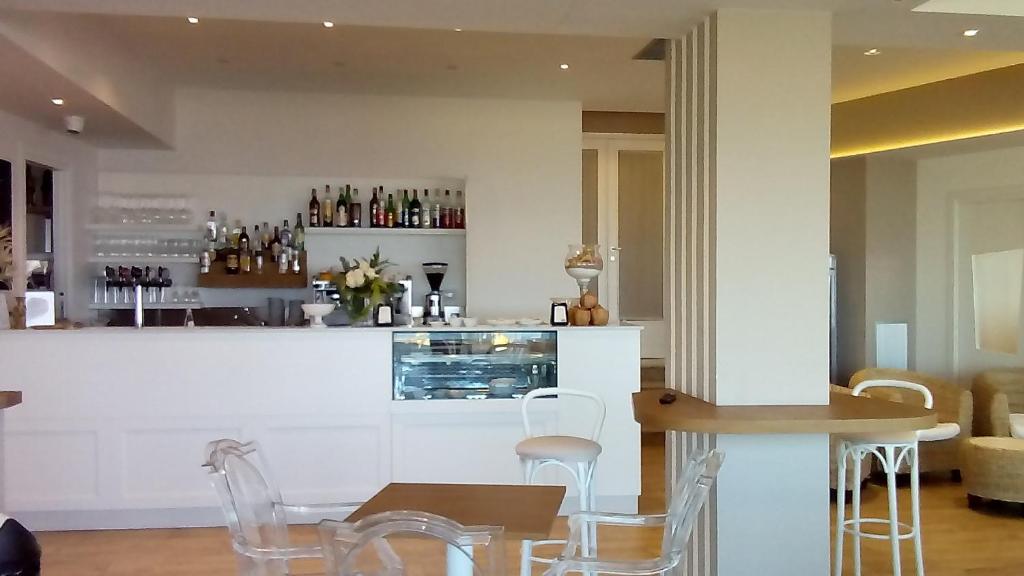 Nápoje v ubytování Hotel Oasi Ristorante Pizzeria