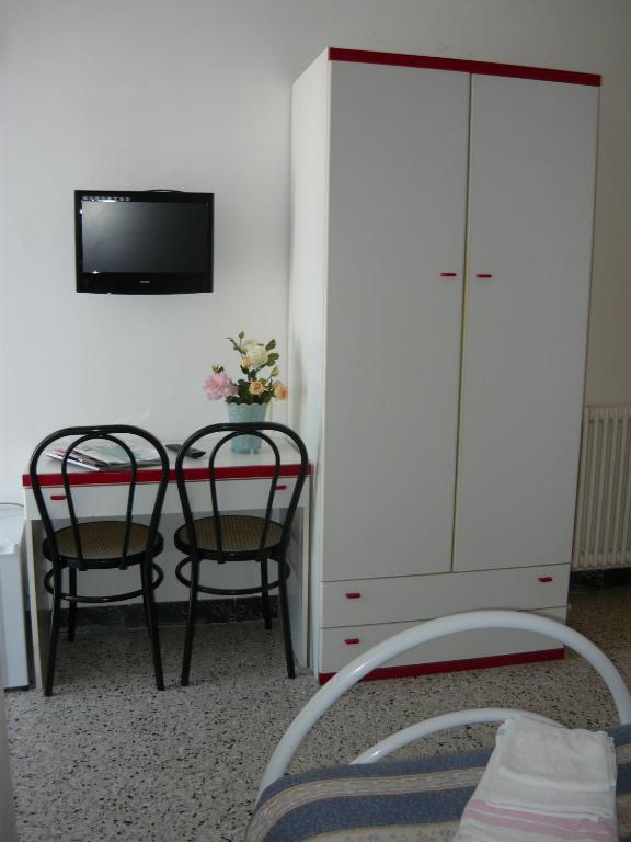 TV a/nebo společenská místnost v ubytování Hotel Acquazzurra